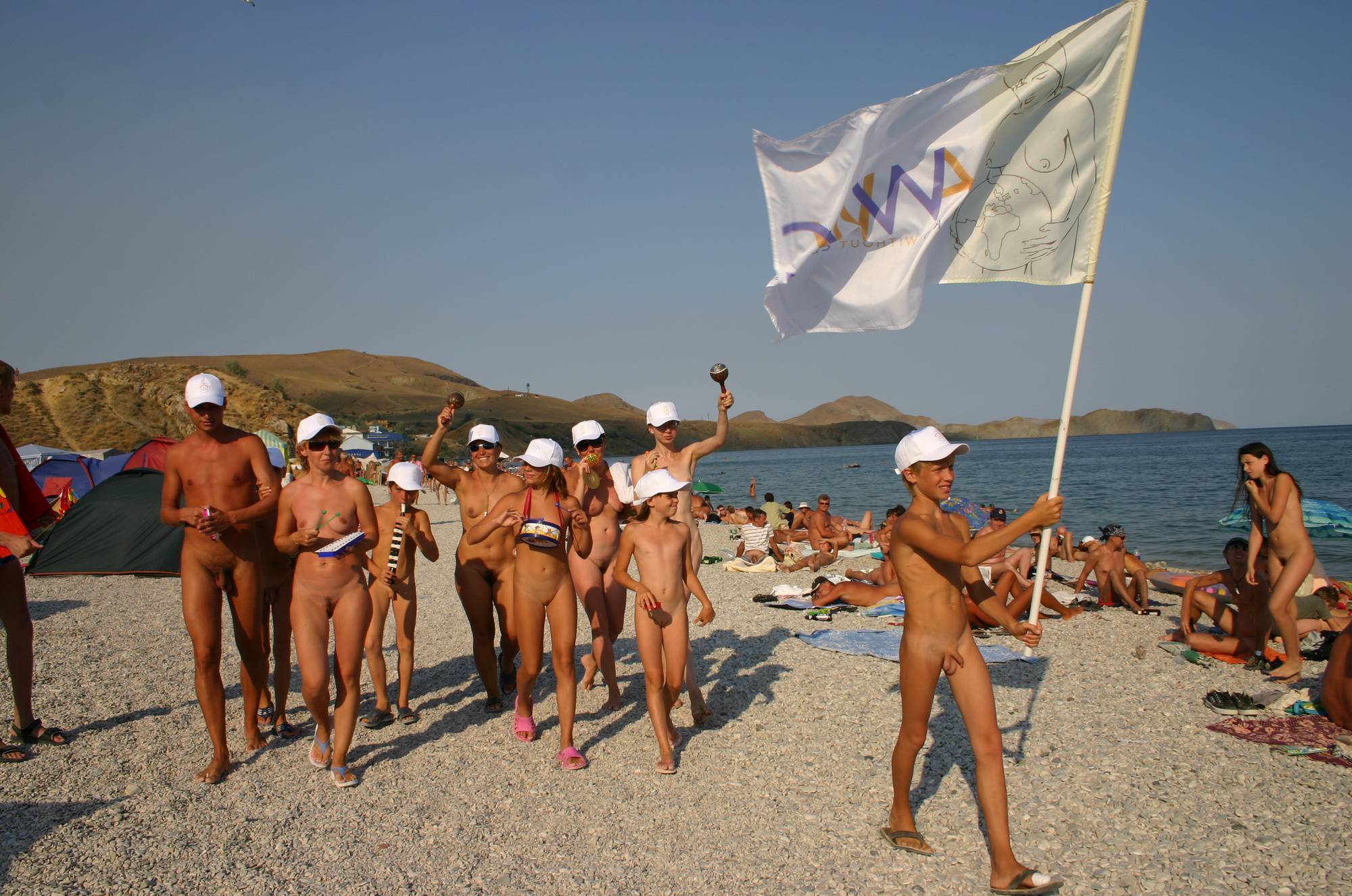 Pure Nudism Images-Flag Follows the Drummer - 1