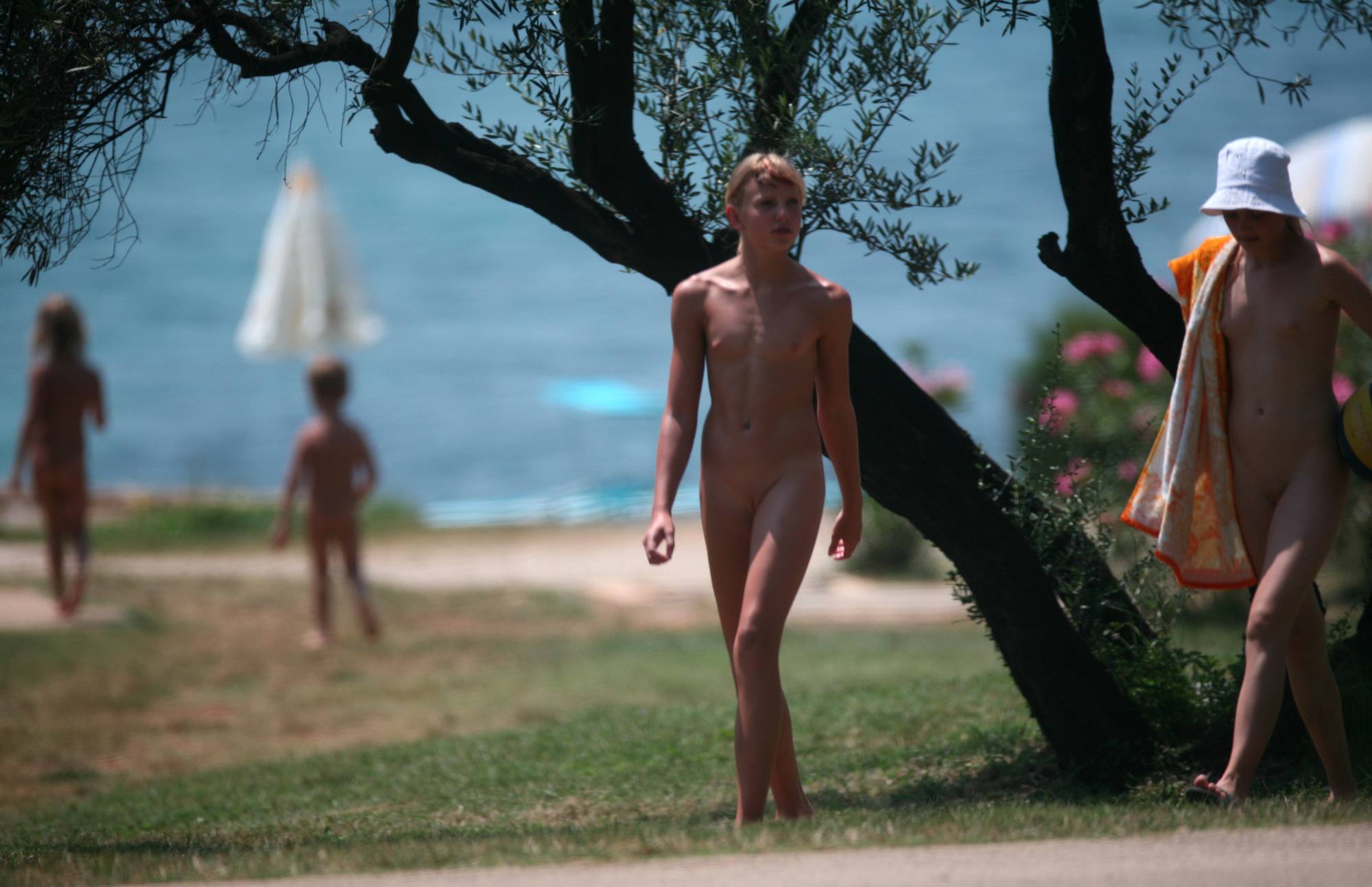Two Nudist Friends Walk - 2