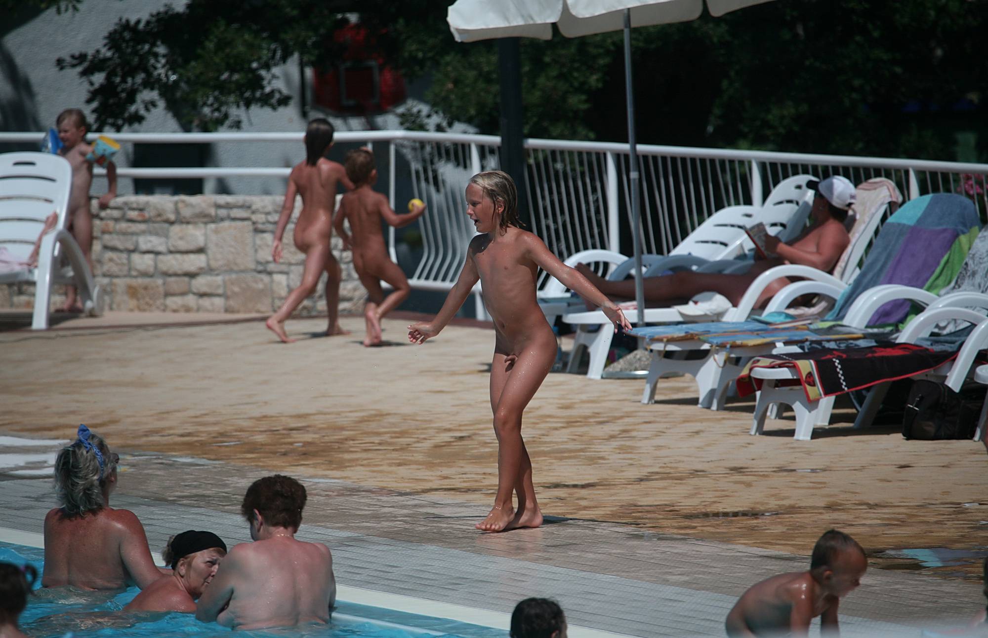 Pure Nudism Gallery-Drag and Drop in the Pool - 1