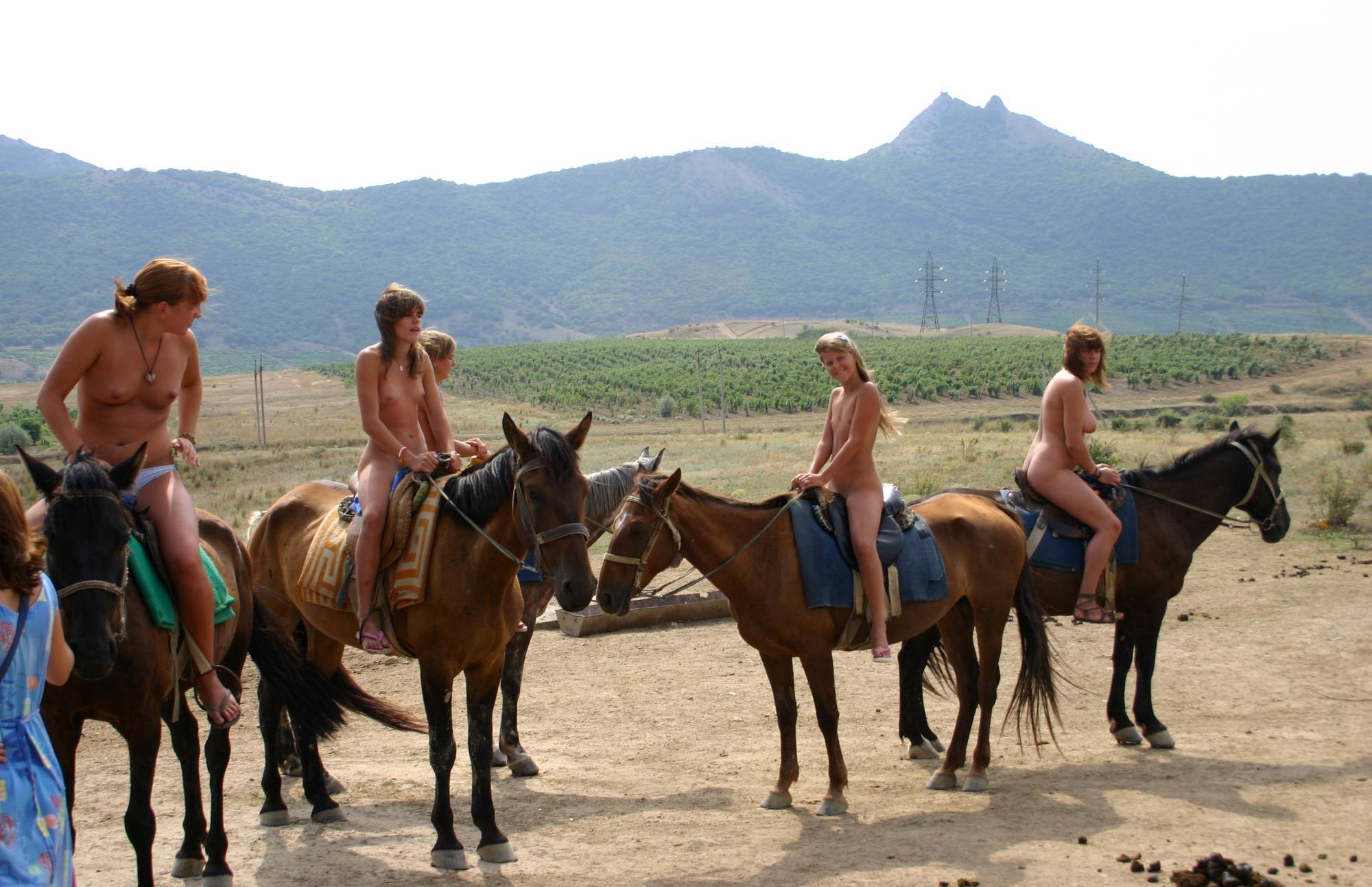 Pure Nudism Photos-Waiting for the Horserides - 2